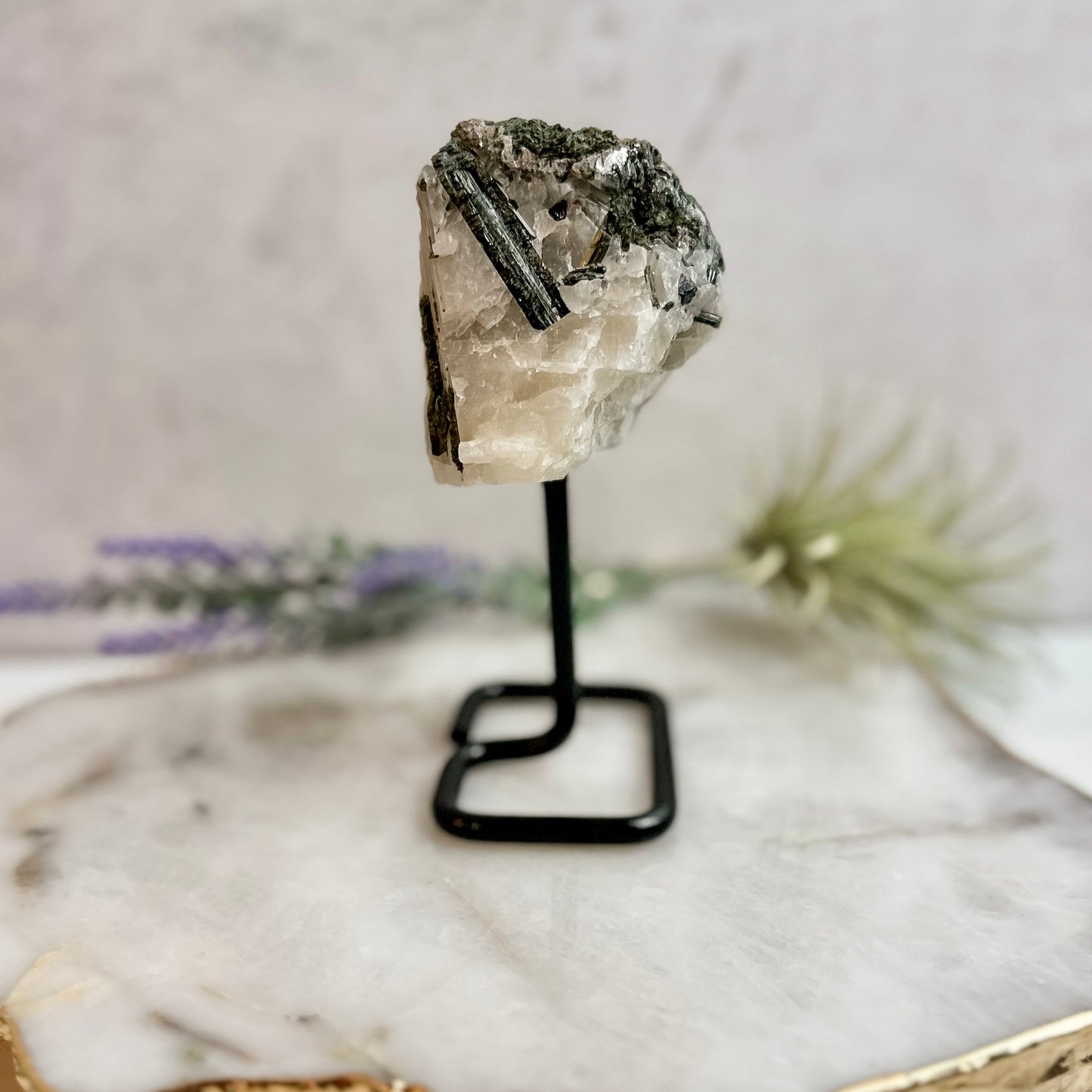 Green Tourmaline in Quartz on stand