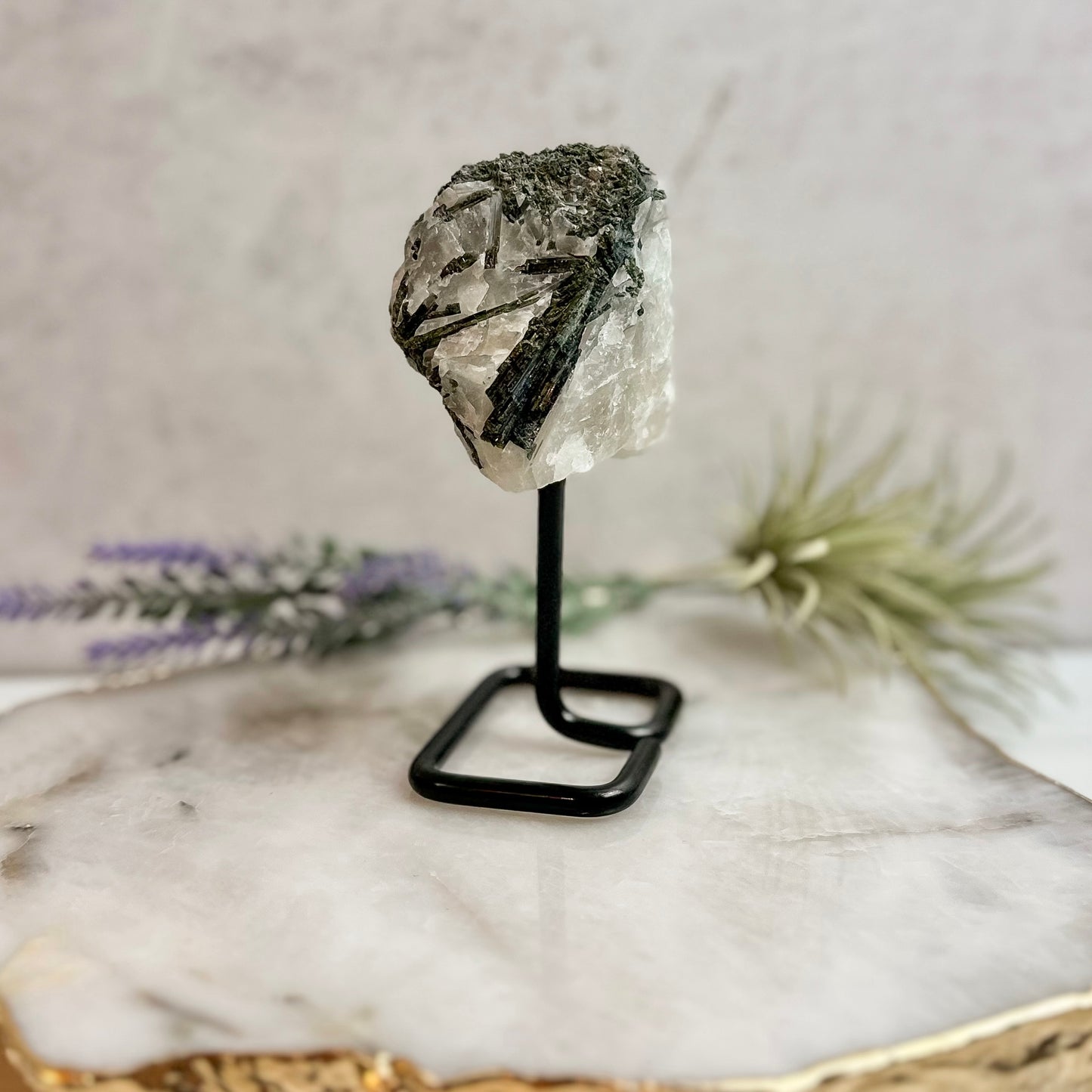 Green Tourmaline in Quartz on stand